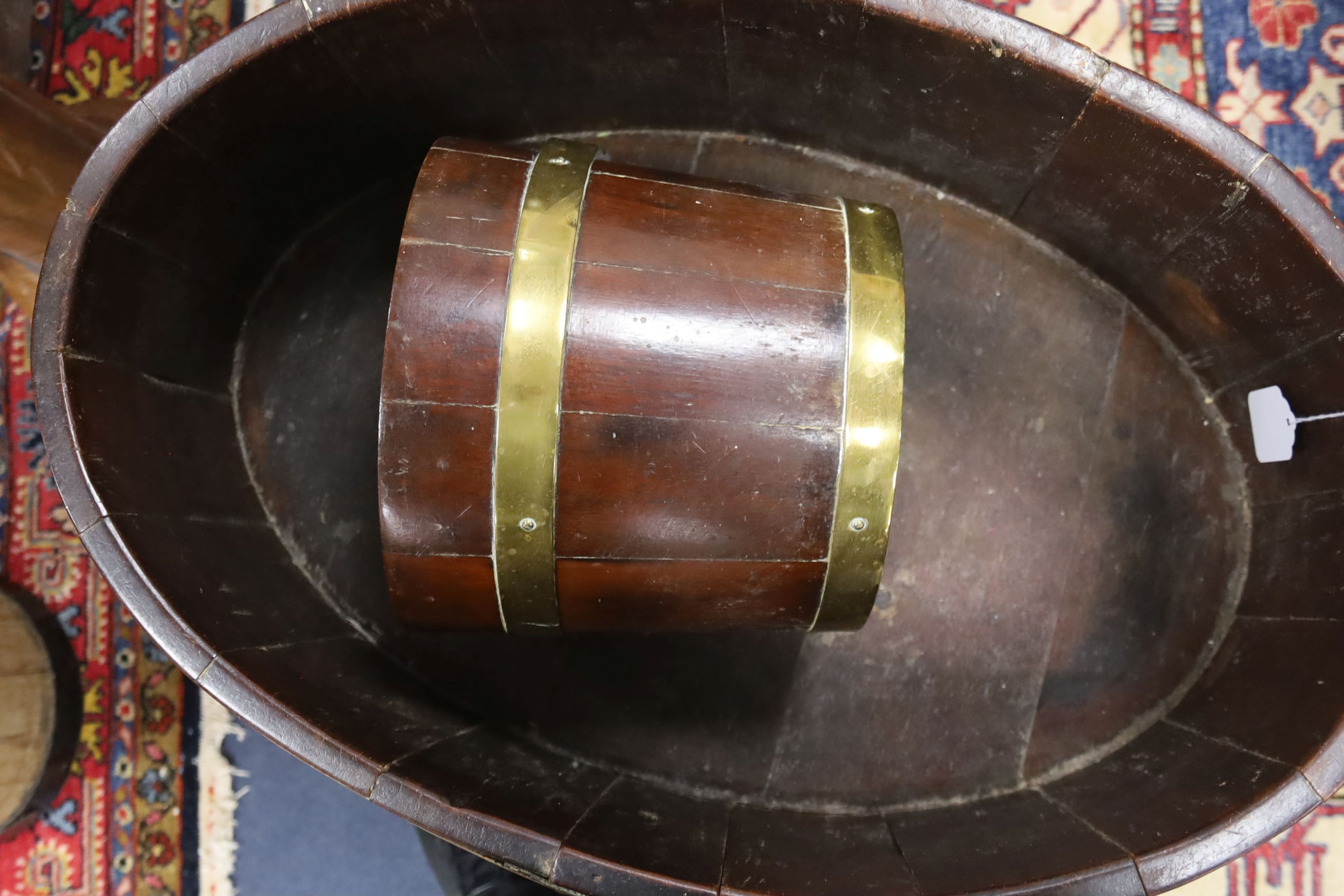 A George III provinical brass bound mahogany planter, width 62cm, depth 42cm, height 60cm, together with a small brass bound mahogany pail
